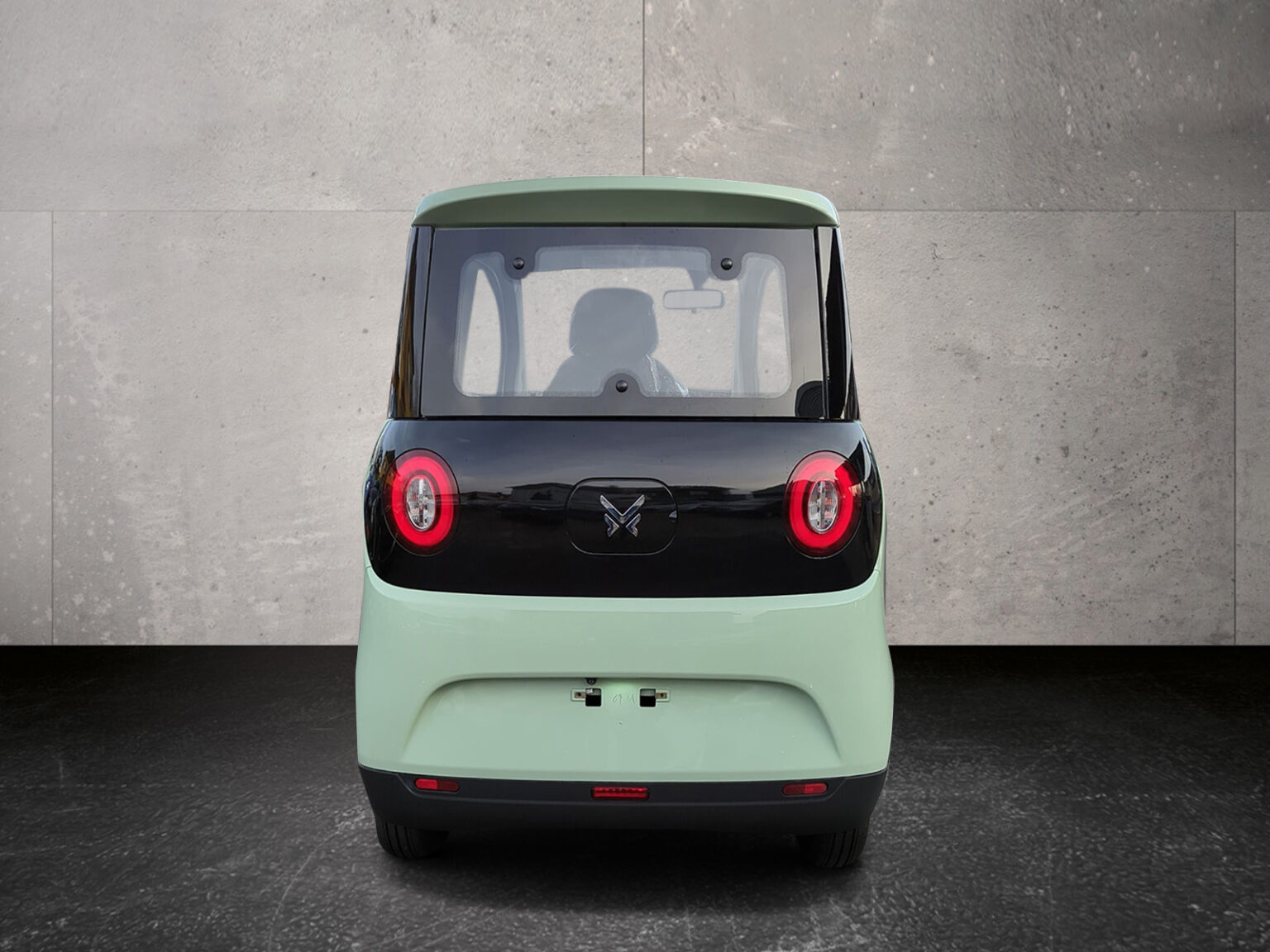 Rückansicht des mintgrünen Microcars mit LED-Rückleuchten