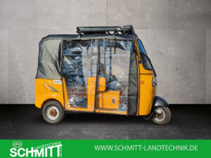 Seitenansicht gelber Cargo Runner HIGo mit geschlossenen Folientüren