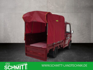 Heckansicht schräg links mit geöffneter Plane des Cargo Runner Toro